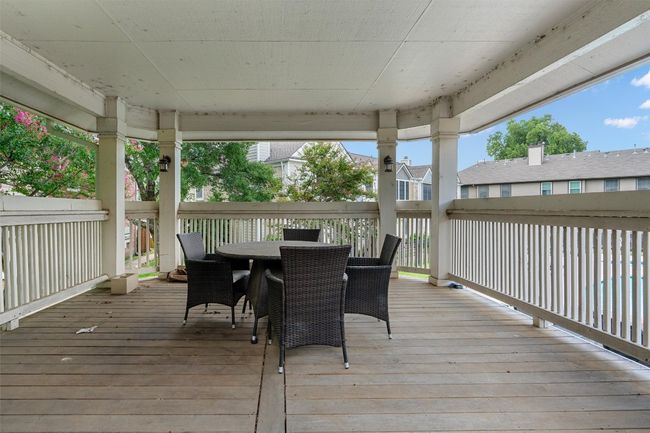Wooden deck featuring outdoor dining space | Image 24