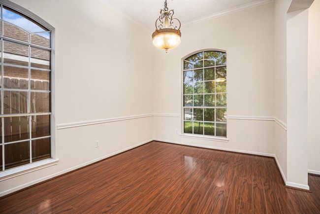 Formal dinning room looking toward front yard. | Image 12