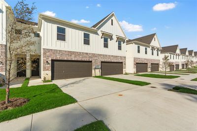 View of front of home with a garage | Image 1