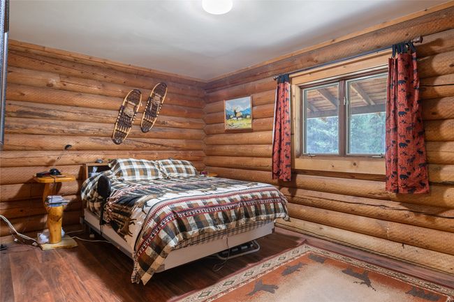 Bedroom featuring dark wood-style flooring | Image 43