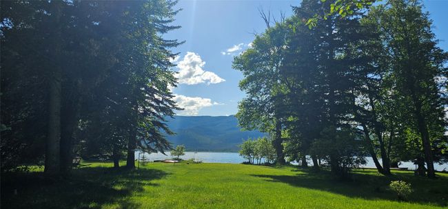 Water view featuring a mountainous background | Image 6