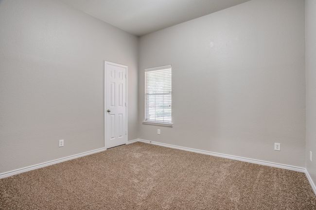 Empty room with carpet flooring and baseboards | Image 13