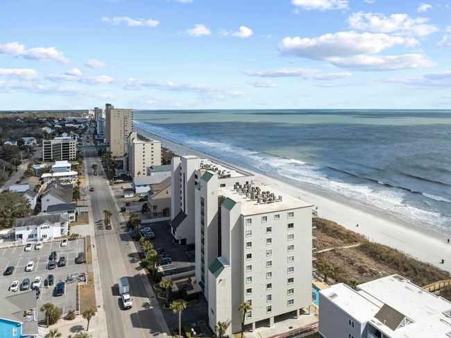 Birds eye view of property with a beach view and a water view | Image 35