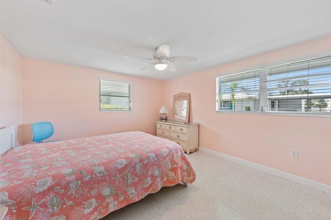 View of the primary bedroom when you enter the room. | Image 15