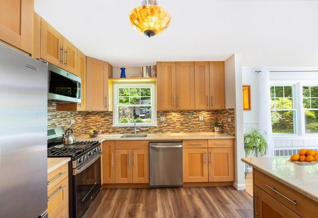 Kitchen with stainless steel appliances | Image 9