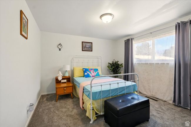 Bedroom featuring carpet flooring and baseboards | Image 20