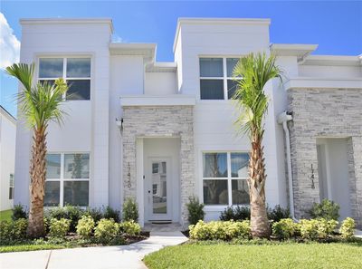 17420 Hidden Forest Drive, Townhouse with 4 bedrooms, 3 bathrooms and null parking in Clermont FL | Image 1