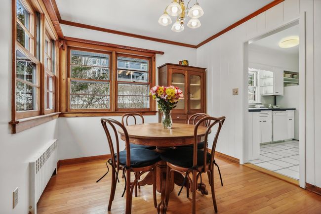 Dining area with view into kitchen | Image 8