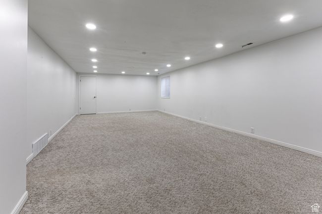 Unfurnished room with recessed lighting, carpet flooring, and baseboards | Image 23