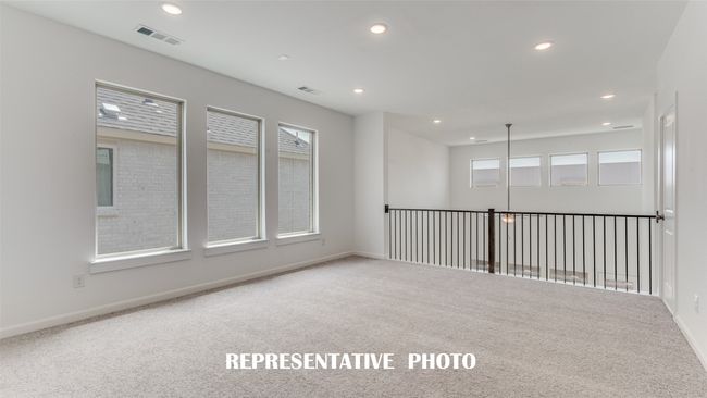 A light filled game room spacious enough to entertain a crowd! REPRESENTATIVE PHOTO. | Image 14