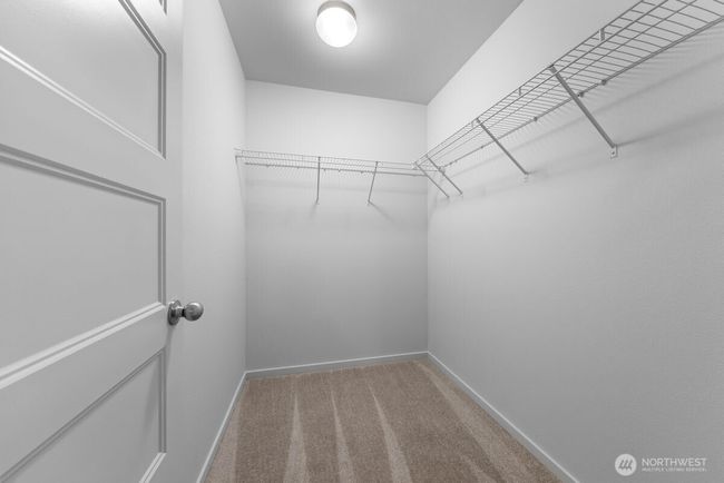 Photographs are for illustrative purposes only. Features, finishes, interior/exterior colors, landscaping and floorplan shown may vary from actual homes built. | Image 16