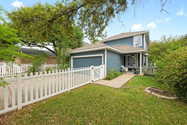 Garage tucked away behind the home | Image 29