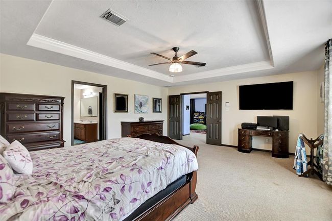This spacious area is perfect for a cozy sitting nook, home office, or nursery. | Image 34