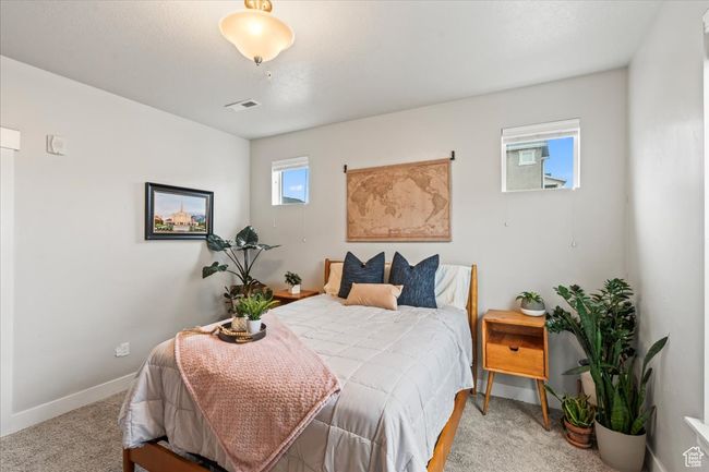 Primary bedroom has extra windows! | Image 14