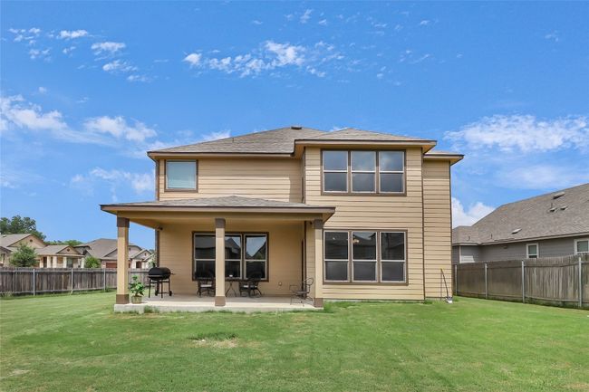 Back of house with a patio and a shingled roof | Image 4