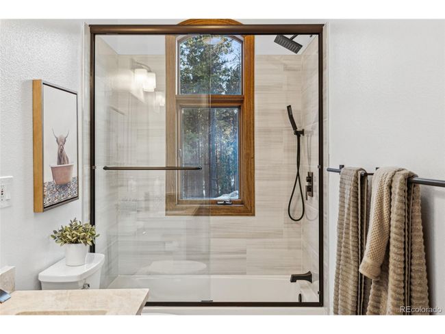 9303 Dauntless Way, House other with 4 bedrooms, 4 bathrooms and null parking in Conifer CO | Image 22