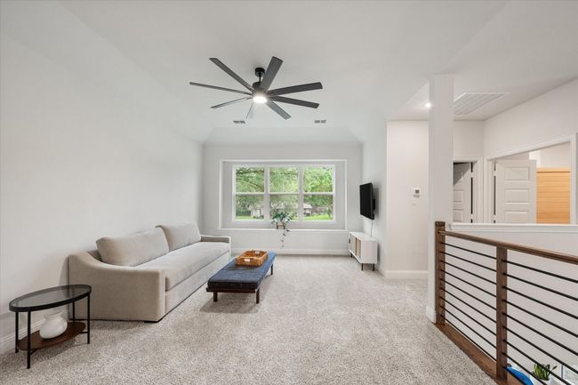 Upstairs has a versatile media room! | Image 27