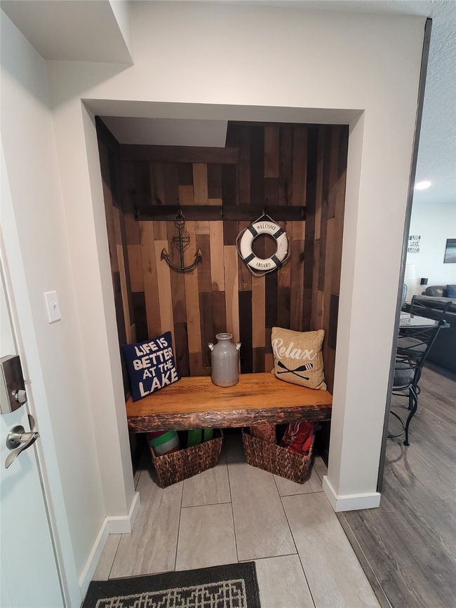 Mudroom with tile patterned floors | Image 10
