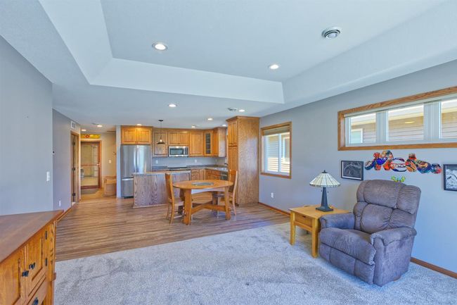Living room facing dining and kitchen spaces | Image 13