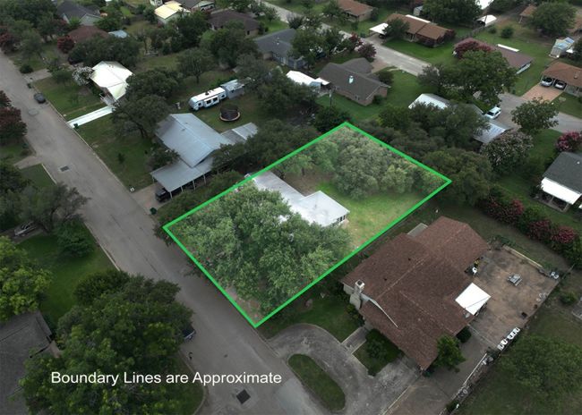 Aerial view of residential area with property parcel outlined | Image 16