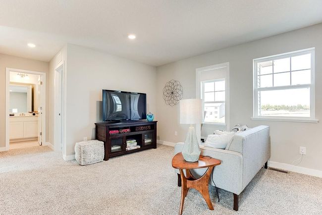 Need more space. Enjoy the upper level loft space. Perfect for another family room or home office. Photo of model home, color & options will vary. | Image 11