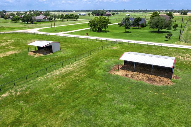 LOAFING SHEDS AND PASTURES...Property Is Fenced With Pipe/No Climb | Image 37