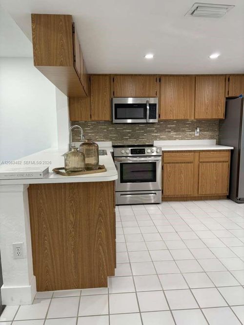 1005-1005 Palm Beach Trace Dr, Royal Palm Beach, FL, 33411-1269 | Card Image
