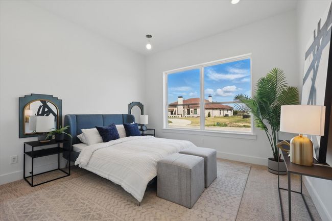 Bedroom with baseboards and light colored carpet | Image 13