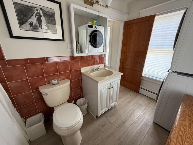 Alternate view of the main floor bathroom/laundry area. | Image 15