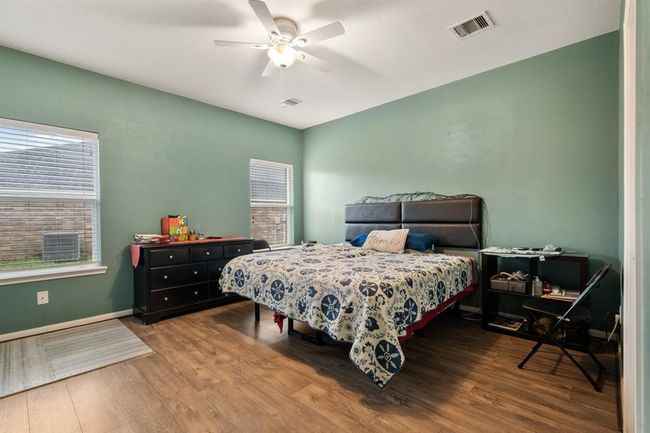 Step into the sanctuary of theprimary bedroom. | Image 14