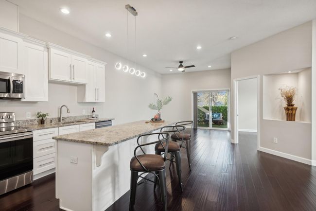 Beautiful open floor plan! Dining room is to the right and living room space and outdoor living space is straight ahead. | Image 4