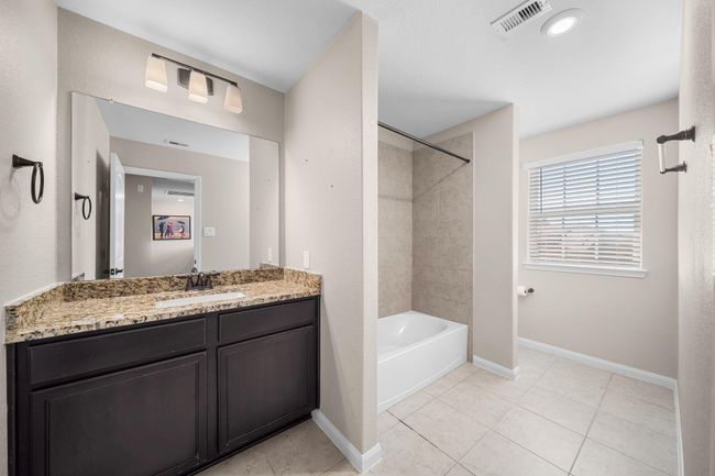 Upstairs full bathroom | Image 18