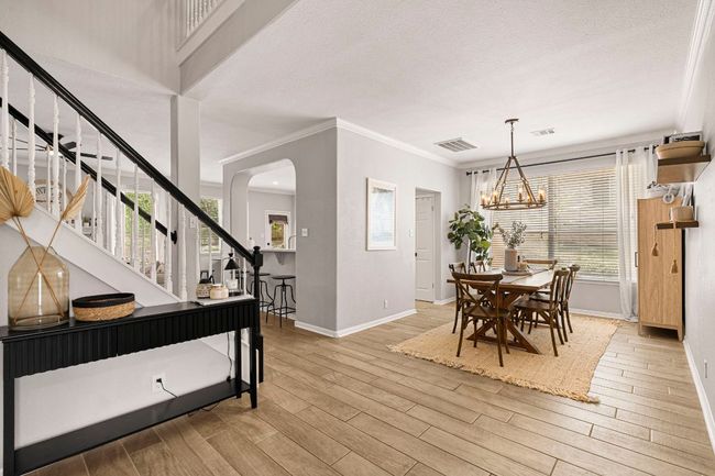 Inviting dining room with plenty of space for family and friends | Image 6