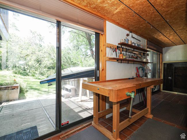 Recreation room with tile patterned floors | Image 56