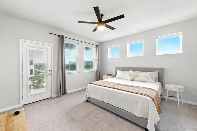 Primary bedroom with automatic shades. | Image 14