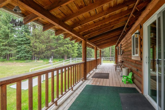 Wooden terrace with a lawn | Image 22