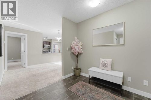 7306-403 Mackenzie Way Sw, Airdrie, AB, T4B3V7 | Card Image