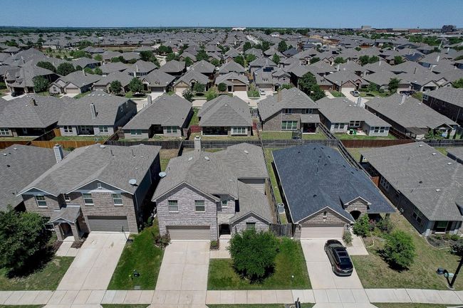 Aerial view of property and surrounding area with nearby suburban area | Image 24