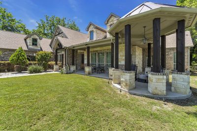 Property features a covered porch with gazebo feature, and ceiling fan | Image 3