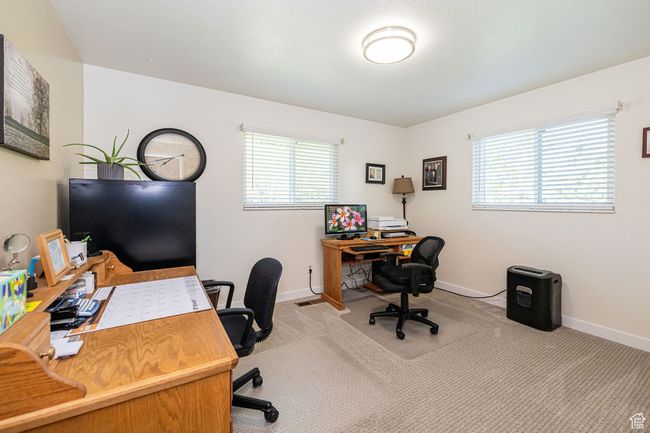 Office featuring baseboards, carpet, and a wealth of natural light | Image 30