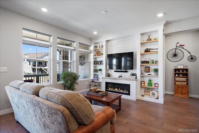 Living room with custom built entertainment center | Image 3