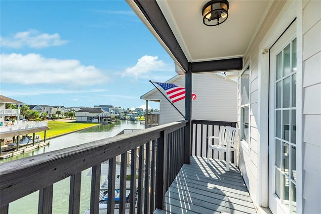 Upstairs deck on the east side of the home - perfect for sipping morning coffee and watching the sun rise | Image 31