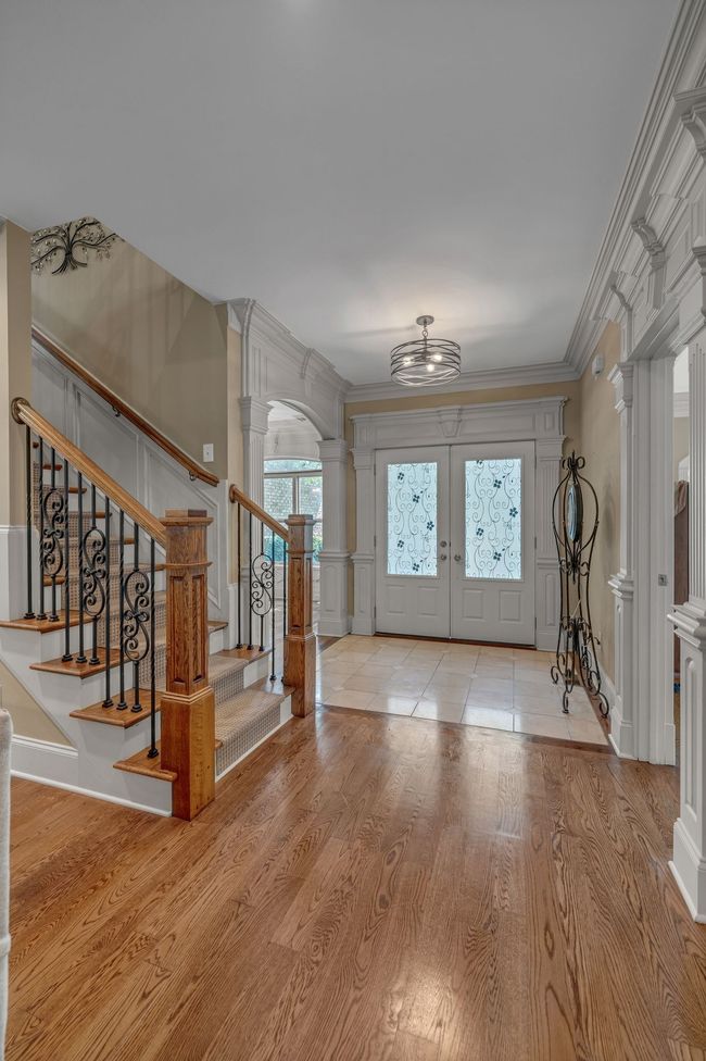 A stunning view of the foyer. | Image 8