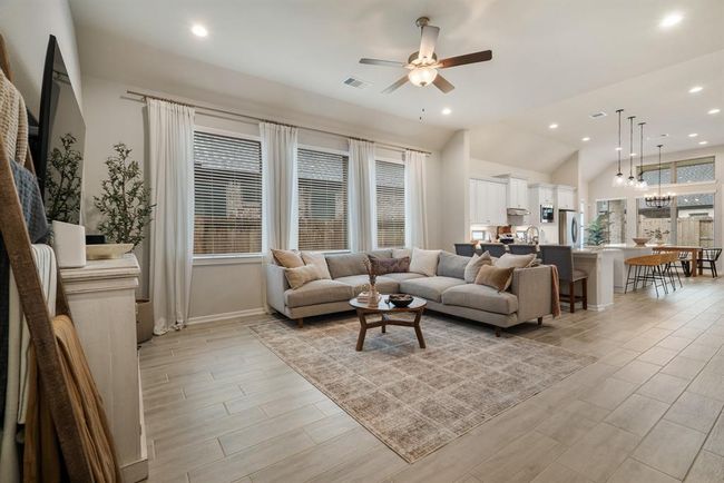 Spacious living room that connects into the kitchen area. | Image 5