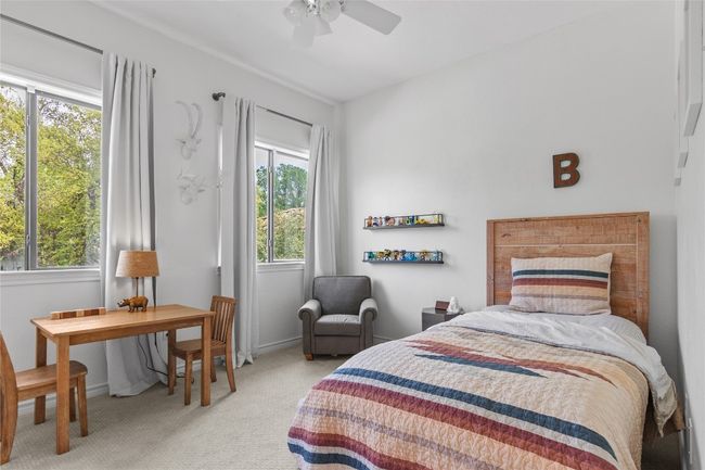 Guest bedroom upstairs with lots of natural light. | Image 30