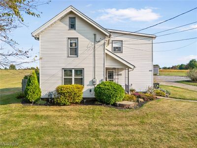 View of side of property with a yard | Image 2