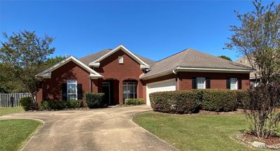 Welcome to this fantastic 4 bedroom, 3 full bath home located in the desirable neighborhood of Deer Creek. | Image 1