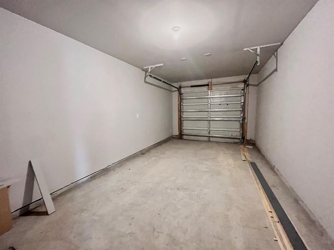 Spacious garage, virtually staged for inspiration. | Image 34