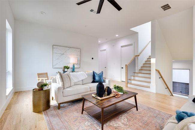 Living room with ceiling fan and light hardwood / wood-style flooring | Image 21