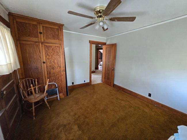 NE bedroom with storage cabinet | Image 28